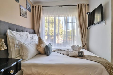 Standard Double Room, Pool View | Individually decorated, individually furnished, desk, laptop workspace