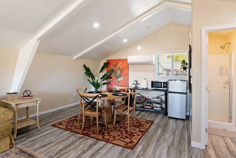 Cozy eat-in area in the Barndominium, perfect for meals and laughs at River Road Retreat.