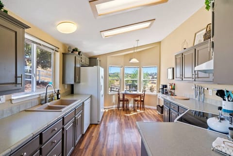 Charming kitchen and cozy nook in the main house at River Road Retreat.