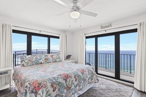 Master Bedroom with King Bed, Ensuite Full Bath, Direct Wraparound Balcony Access and Beachfront View