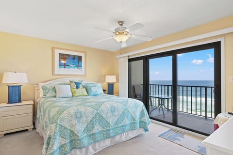 Master Bedroom with King Bed, Ensuite Full Bathroom and Beachfront View with Direct Balcony Access