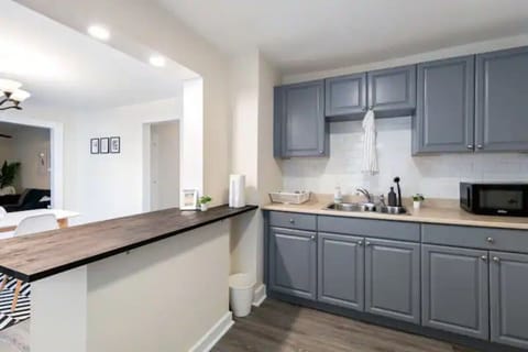 As you step into the kitchen, the clean lines and functional design make you eager to start cooking your favorite dishes.