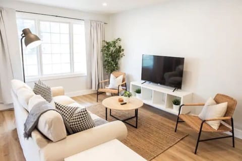 As you take a seat in the living room, the comfortable furniture and tasteful design make it easy to unwind.