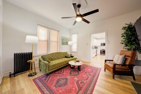 Convertible futon that adjusts into a bed by pushing forward and then backward