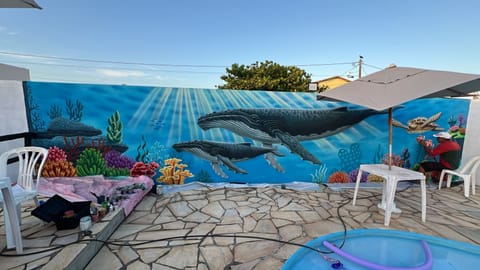 Outdoor pool, open 10:00 AM to 10:00 PM, pool umbrellas, sun loungers