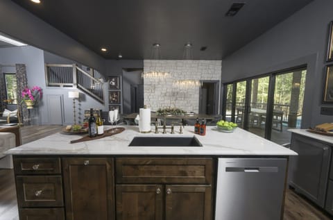 Even when preparing meals in the kitchen, you are still in the middle of the action.