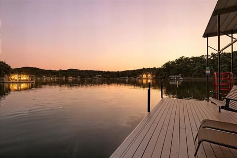 Welcome to Dockside Dreams. Enjoy breathtaking views of the lake, sunrise to sunset from nearly every space in this beautiful home!