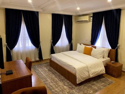 Deluxe Room, Balcony, City View | Desk, laptop workspace, free WiFi