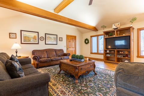 Great room with two couches and one sleeper sofa.