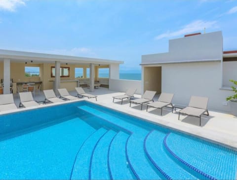Outdoor pool, open 9:00 AM to 10:00 PM, sun loungers