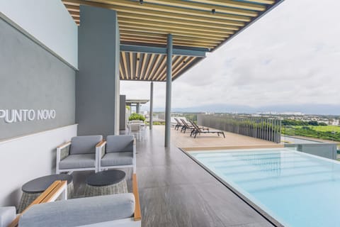 Outdoor pool, open 9:00 AM to 10:00 PM, sun loungers