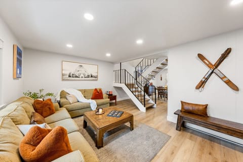 Comfy living room with wood burning fireplace.