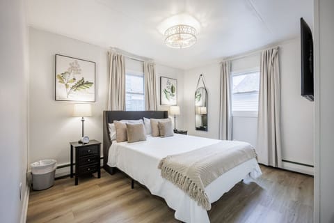 Bedroom 1: Thoughtfully designed with comfort in mind, offering plush bed, ample closet space, and plenty of natural light to help you feel relaxed and refreshed during your stay. Sleeps 2 (Queen Bed)