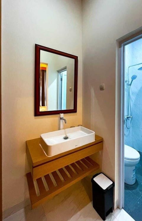 Shower, slippers, towels, soap