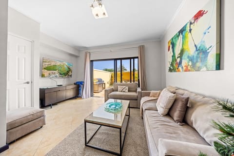 The open layout effortlessly blends indoor comfort with outdoor living, creating a spacious and inviting flow.