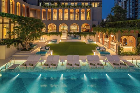 Outdoor pool, open 7:00 AM to 7:00 PM, pool umbrellas, sun loungers
