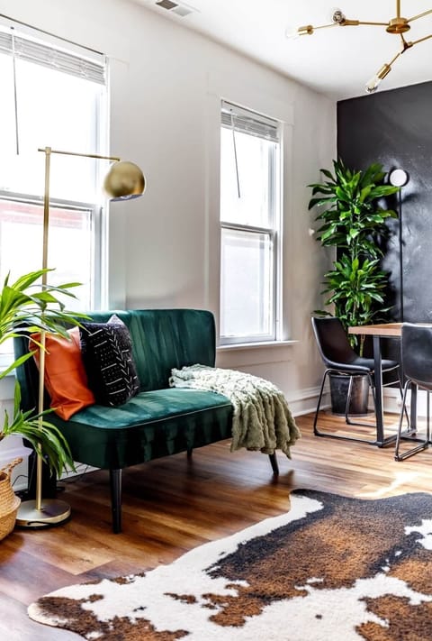 kick back & relax in this lush living room with good vibes only