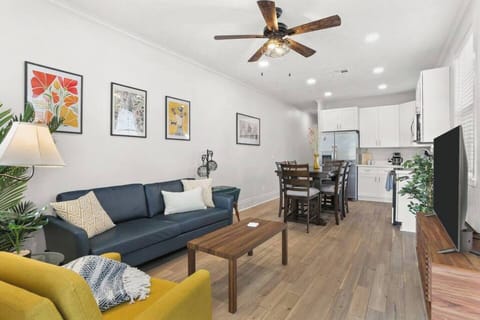 Relax in the open kitchen/living area with dining for 6, comfy seating, Roku TV, fast Wi-Fi & AC