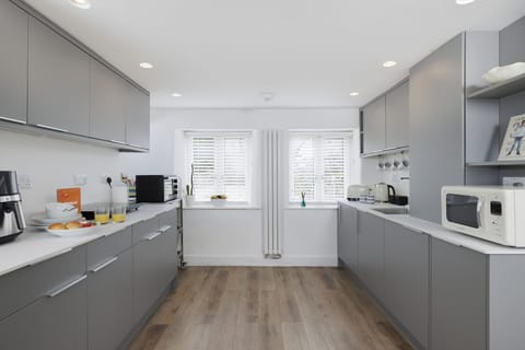 Natural light fills the well-equipped kitchen