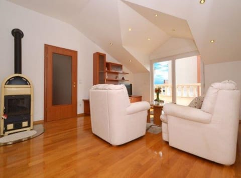 Apartment (Two Bedroom Apartment) | Living room | 32-inch flat-screen TV with cable channels