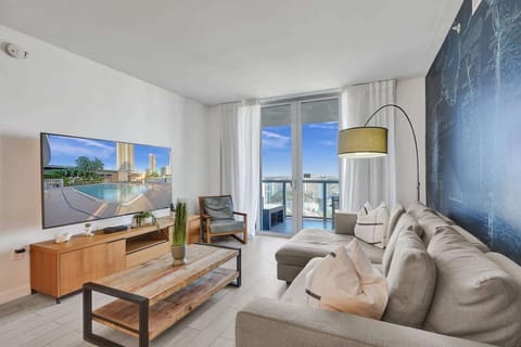 Modern open space living room with City and Canal view