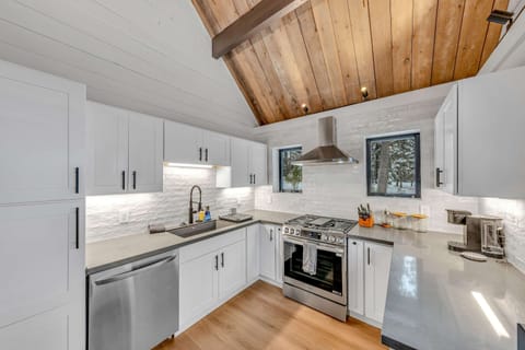 Kitchen: Keurig, kettle, toaster, cooking utensils, tableware