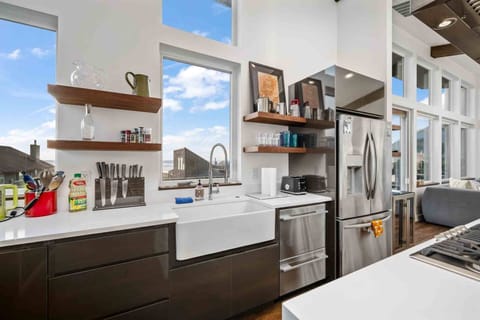 The centrally located island stove allows for an efficient cooking experience.