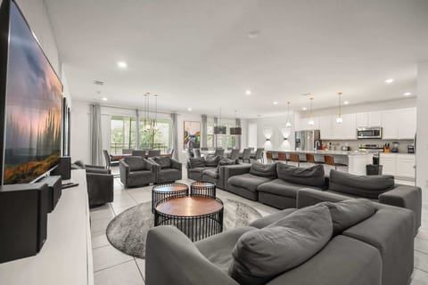 Experience luxury and comfort in this expansive living area with modern amenities, perfect for entertaining large groups.