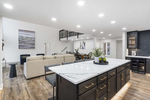 The chic, open kitchen offers ample space & every home comfort