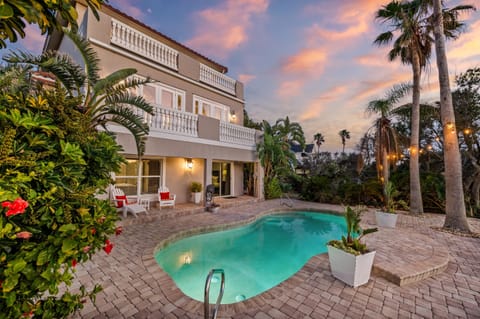 Sunset poolside oasis perfect for unwinding after a day in the sun