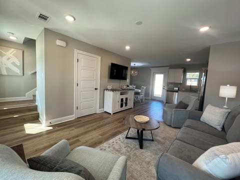 Ariel view of downstairs from living room area (door by TV leads to 1/2 bath)