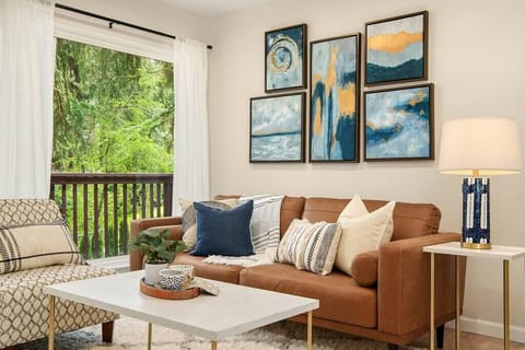 Main level living/family room, slide door open to deck