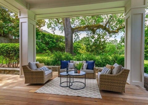 Lounge w/ a good book or cool drink in the gentle daylight w/ a golf course view