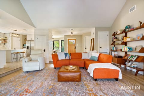 Seamlessly connecting the living and dining areas, this open layout creates a sense of flow and connection. Perfect for entertaining or simply relaxing in a bright and airy space.