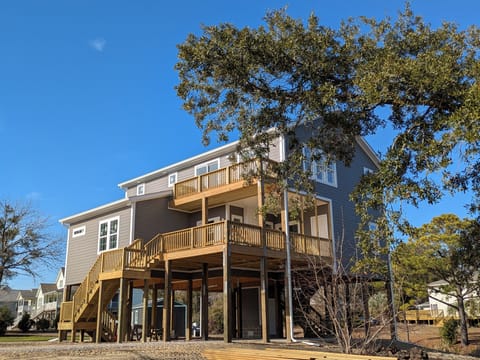 New Construction with spacious lot and deck for outdoor games and entertaining
