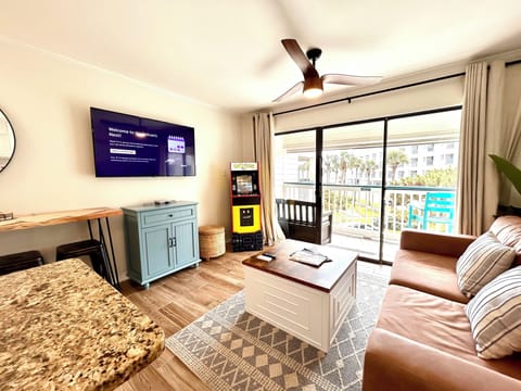 Couch opens into a queen size sleeper. Linens located inside the coffee table.