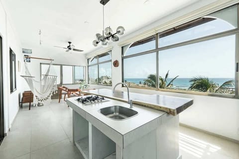 Open kitchen and living area with sea view