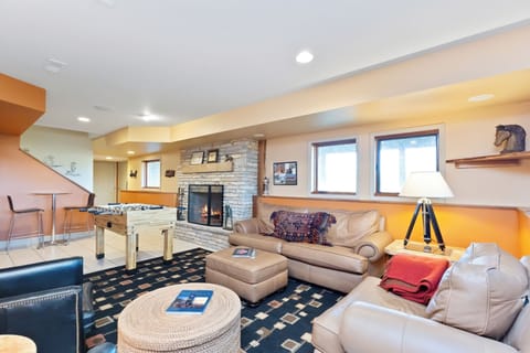 The lower level offers comfortable seating, creating a cozy and inviting space for relaxation.