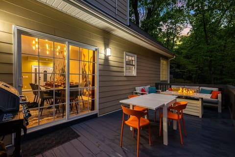 Enjoy dinner under the stars with firelight glowing nearby