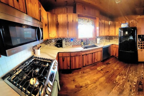 Large kitchen with plenty of counter and cabinet space. Fully stocked!