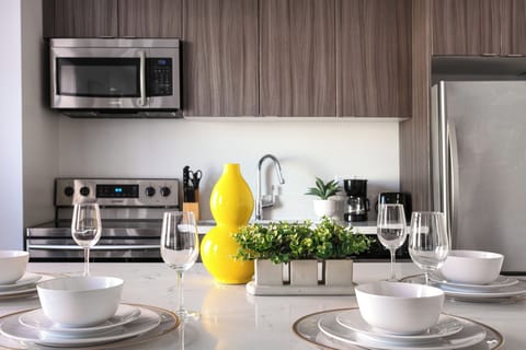 Deluxe Double Room, City View | Private kitchen | Full-size fridge, microwave, stovetop, toaster