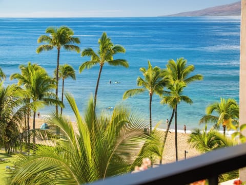 Take in picturesque views of Ka'anapali Beach framed by swaying palms, just steps away from Suite 382.