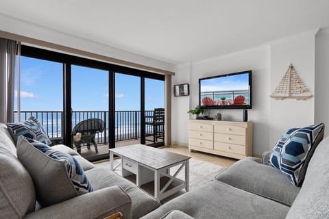 Relax in style with ocean views and your favorite shows just a click away