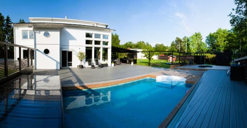 Large terrace with Pool, Hot tub, Ping pong table, Fusball games, Dart, Barbecue area, TV 