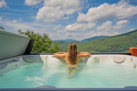 Enjoy apreski in our hot tub overlooking the mountains
