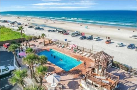 Full vacation property overview with ocean and pool views