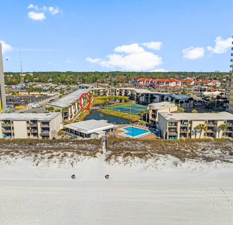 Scenic Retreat: Just steps from pristine beaches with pools and picturesque views!