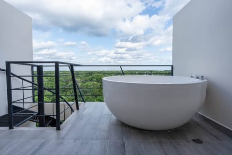 Private rooftop with jacuzzi and views—your Tulum escape awaits!