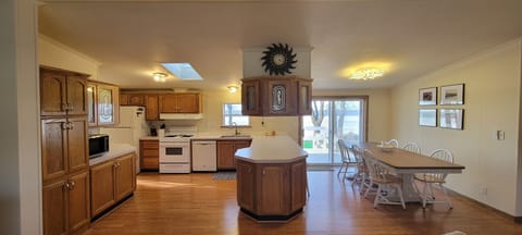 Kitchen and dining area with views of the bay.
