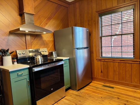 The kitchen is fully equipped with all new appliances.
